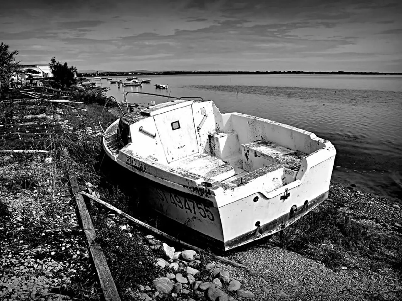 In this image we can see a sea. There are few watercrafts sailing in a sea. A watercraft is placed...