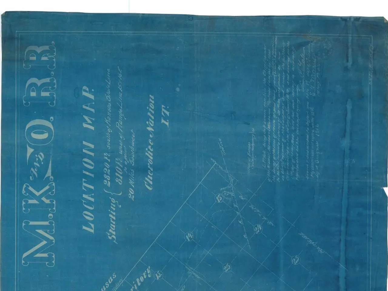The image shows a blue sheet of paper with a map of the Indian Territory on it. The map is detailed...