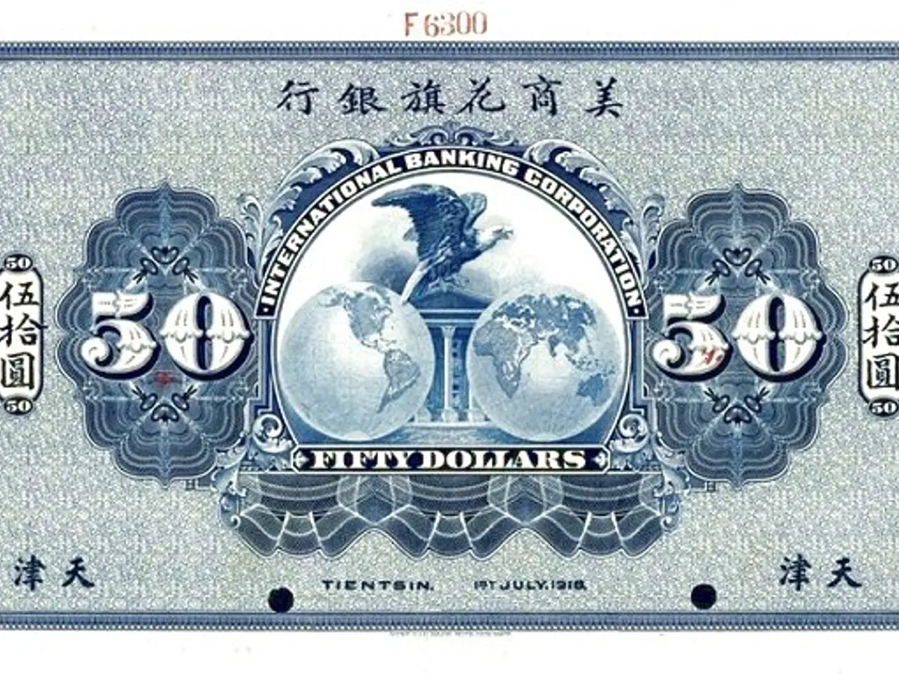 The image shows a blue and white Chinese banknote with a picture of a globe on it. The text on the...