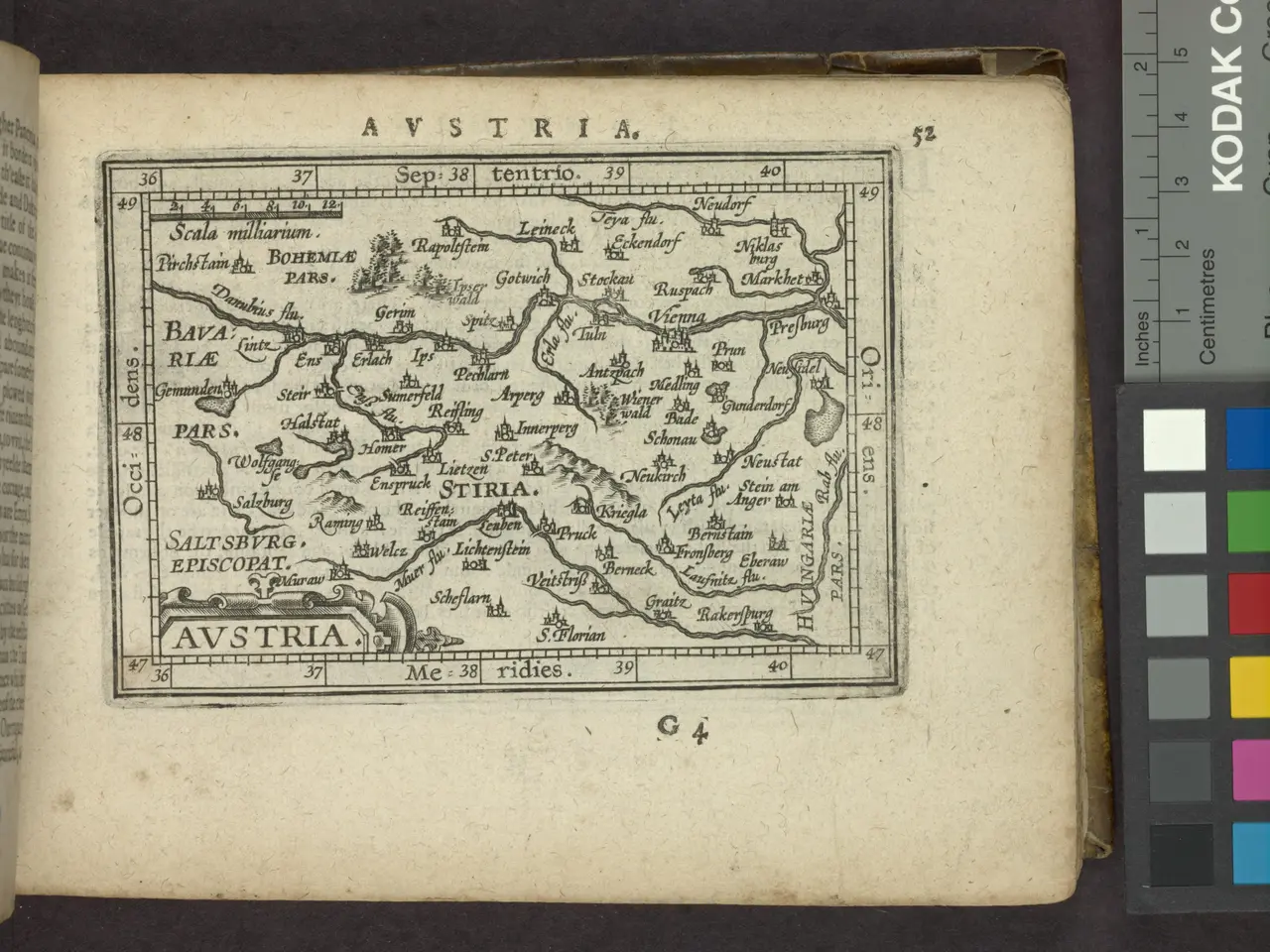 The image shows an open book with a map of Austria on it. The map is detailed and shows various...