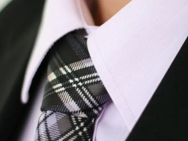 Airport fashion tips unveiled by Jamie Lee Curtis, featuring smart black tailoring paired with...