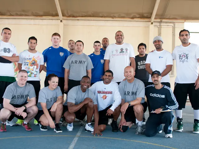 In this image we can see some group of persons wearing T-shirts and shorts standing and some are...