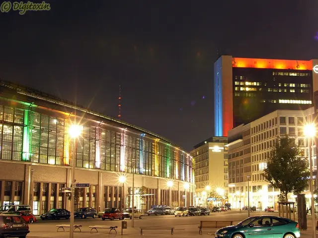 This image is taken during the night time. In this image we can see the buildings with lightning....