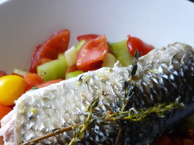 In this image we can see vegetable food items and there is a meat on it in the plate.