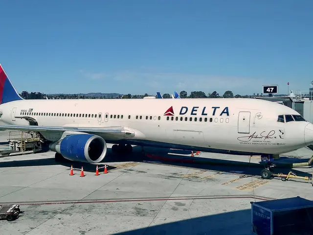 The image shows a Delta Air Lines Boeing 737-800 at Los Angeles International Airport, surrounded...