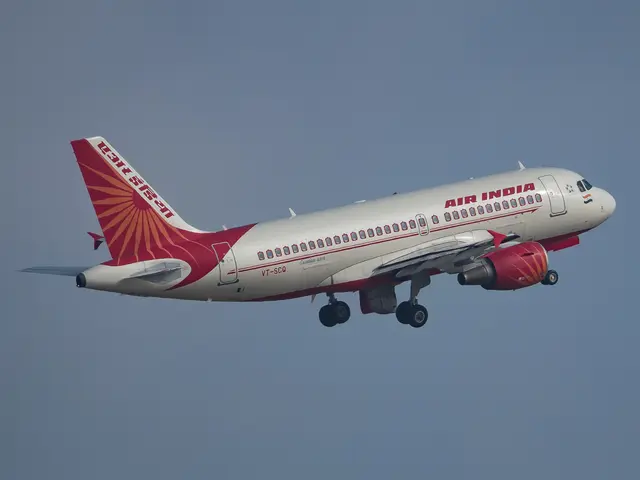 The image shows an Air India Airbus A320-200 in flight, with its white and red livery standing out...