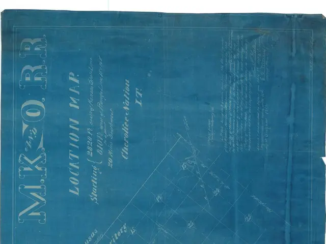 The image shows a blue sheet of paper with a map of the Indian Territory on it. The map is detailed...