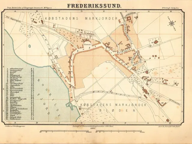 The image shows an old map of the city of Frederiksund, Denmark, with text written on it. The map...