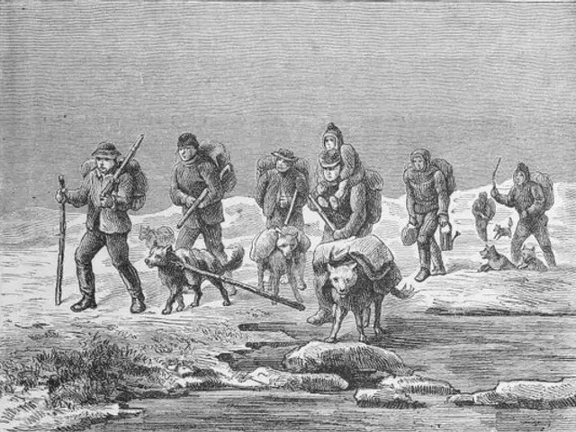 The image shows a group of people walking across a snow covered field, with some of them carrying...