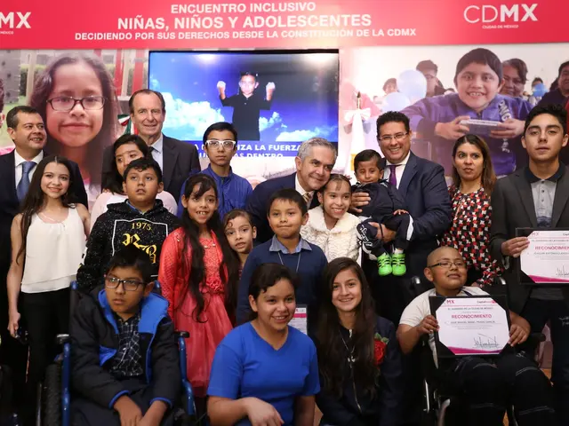 The image shows a group of people posing for a photo in front of a banner with text and images....