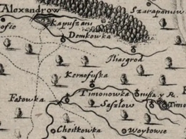 The image shows an old map of the city of Tuscany, Italy, with text written on it. The map is...