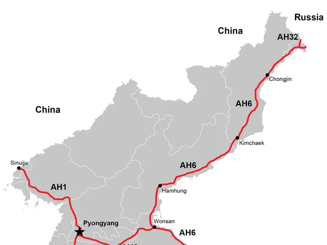 The image shows a map of North Korea with a red line indicating the route of a train from Pyongyang...