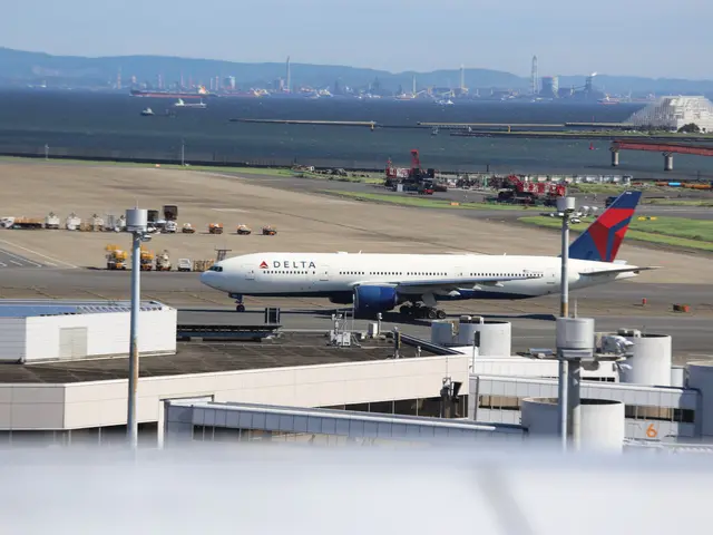 The image shows a Delta Air Lines Boeing 777-300ER at San Francisco International Airport. We can...